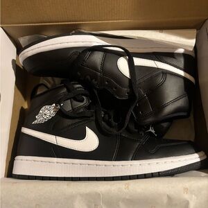 Brand new women’s Jordan 1 Mid Black White size 10.5